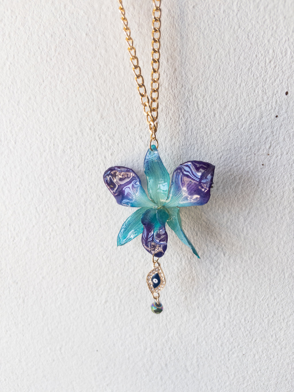 Cadena Dorada Ojo Azul Orquidea